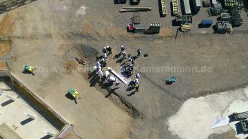 Foto mit Drohne: Richtfest auf einer Baustelle, mit professioneller Drohne festgehalten als Foto- und 4K-Videodokumentation.