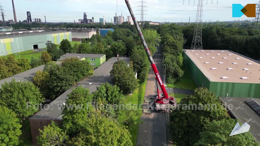 Luftaufnahmen für Videoproduktion bei Großtransport einer 2000-Kilo-Netwon-Zugprüfmaschine in Duisburg