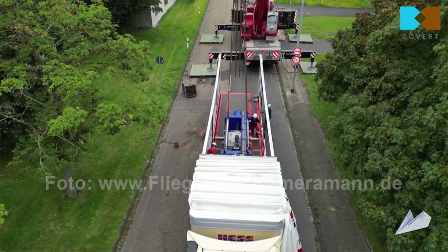 Luftaufnahmen für Videoproduktion bei Großtransport einer 2000-Kilo-Netwon-Zugprüfmaschine in Duisburg