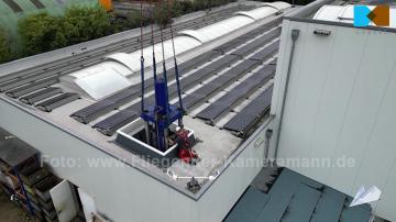 Foto mit Drohne: Luftaufnahmen für Videoproduktion bei Großtransport einer 2000-Kilo-Netwon-Zugprüfmaschine in Essen
